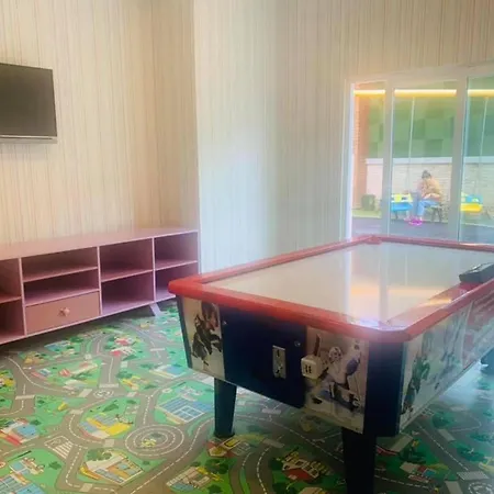 Olimpiya Garden Апартаменты *